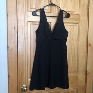 AQUA sleeveless black dress with lace trim